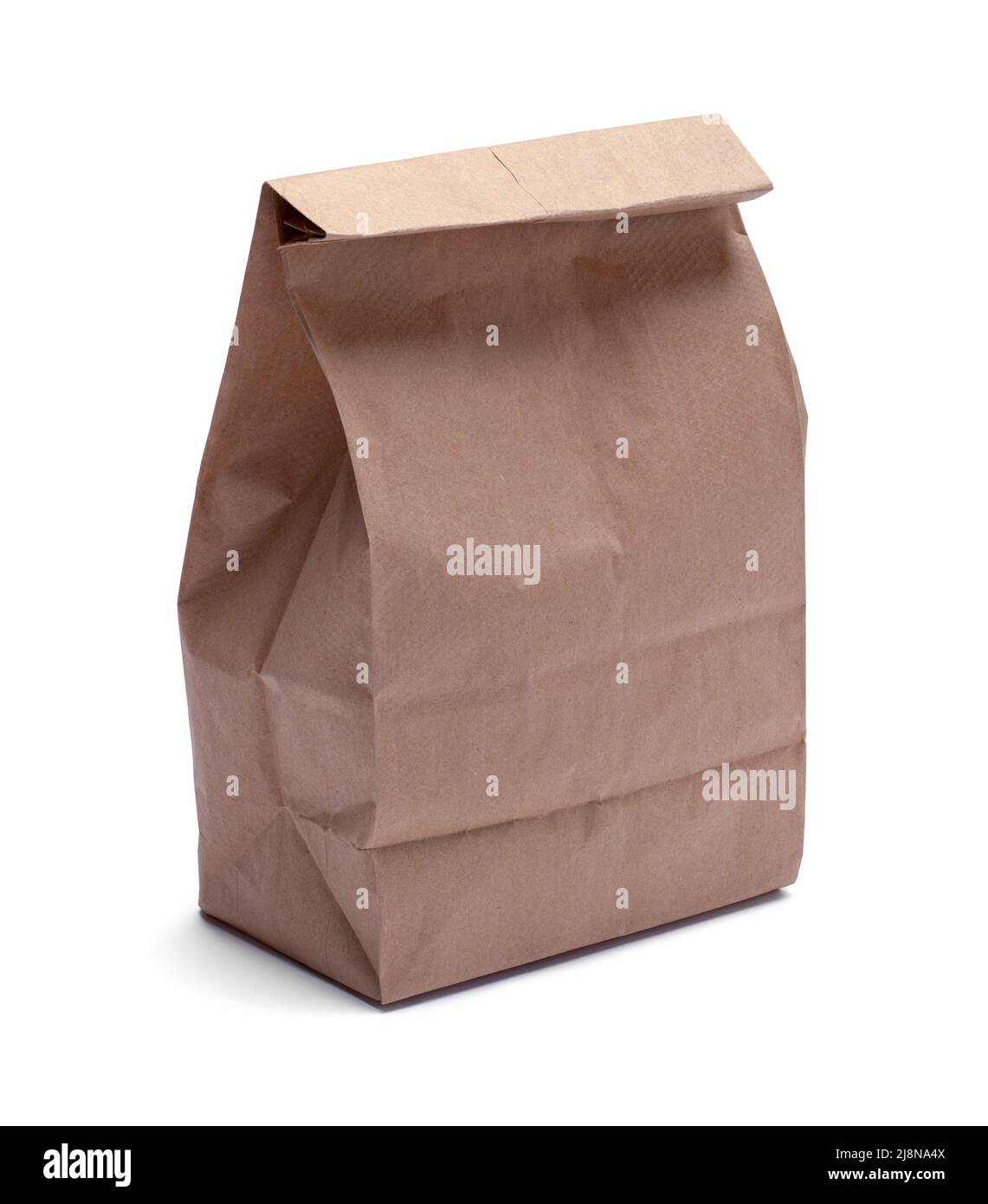 Full Brown Paper Bag Cut Out on White. Stock Photo