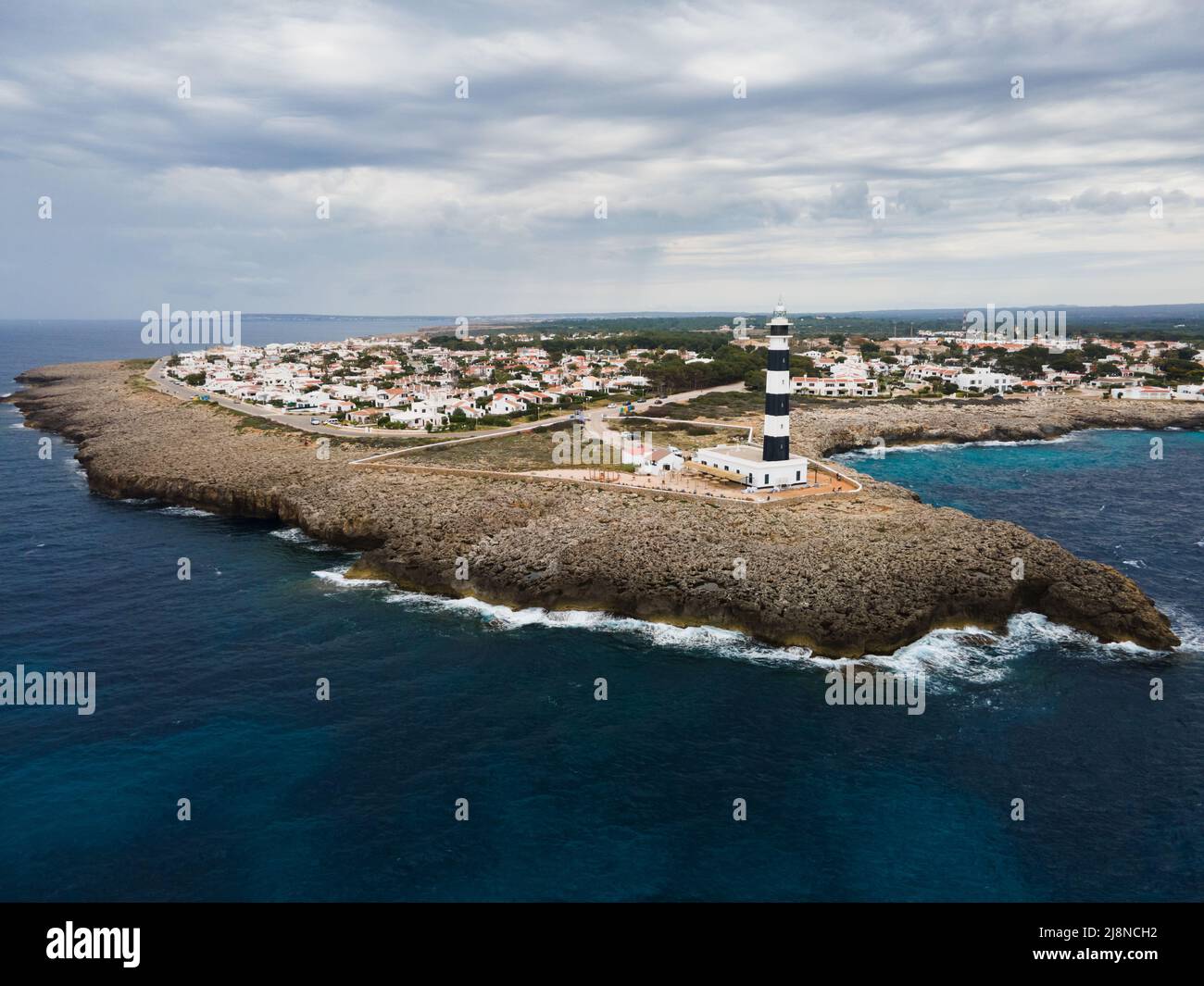 Aerial view Cap d'Artrutx Lighthouse on Menorca, Spain. Stock Photo