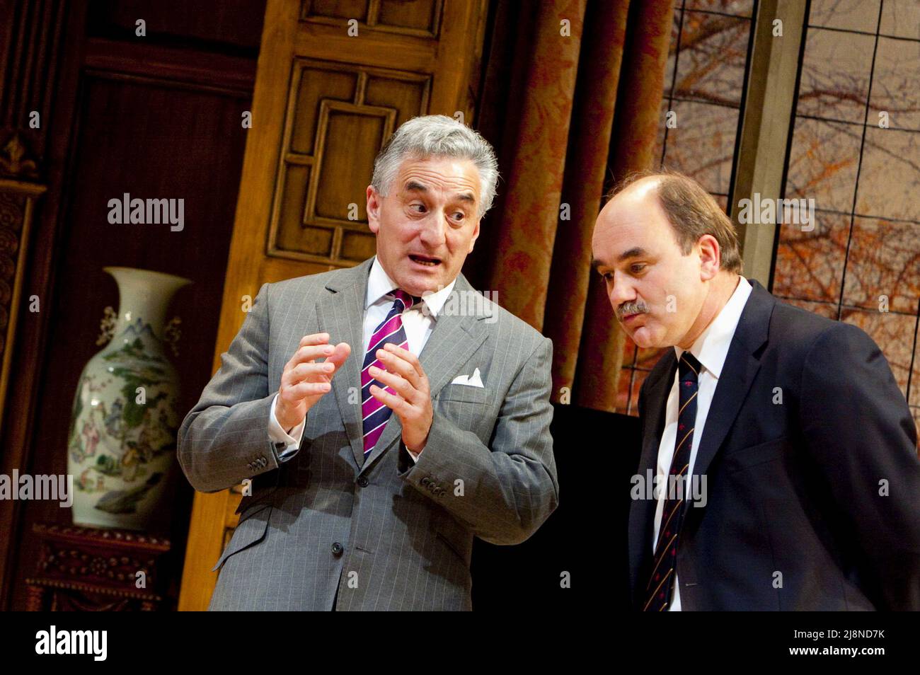 l-r: Henry Goodman (Sir Humphrey Appleby), David Haig (Jim Hacker, Prime Minister) in YES, PRIME MINISTER by Antony Jay & Jonathan Lynn at the Chichester Festival Theatre, West Sussex, England  20/05/2010  design: Simon Higlett  lighting: Tim Mitchell  director: Jonathan Lynn Stock Photo