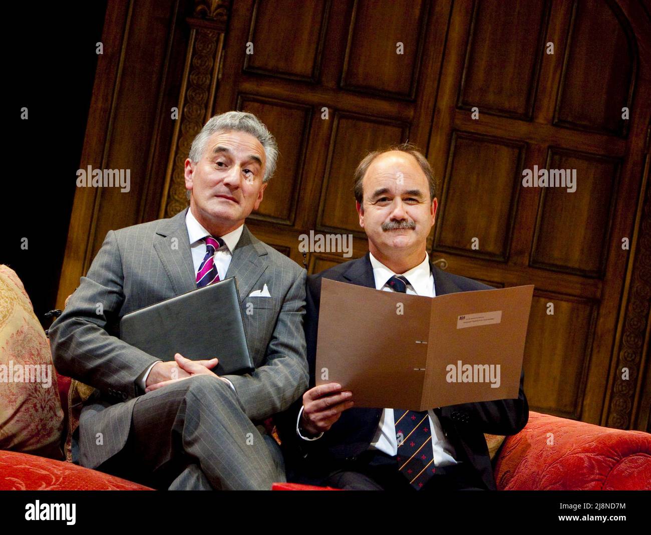 l-r: Henry Goodman (Sir Humphrey Appleby), David Haig (Jim Hacker, Prime Minister) in YES, PRIME MINISTER by Antony Jay & Jonathan Lynn at Chichester Festival Theatre, West Sussex, England  20/05/2010  design: Simon Higlett  lighting: Tim Mitchell  director: Jonathan Lynn Stock Photo