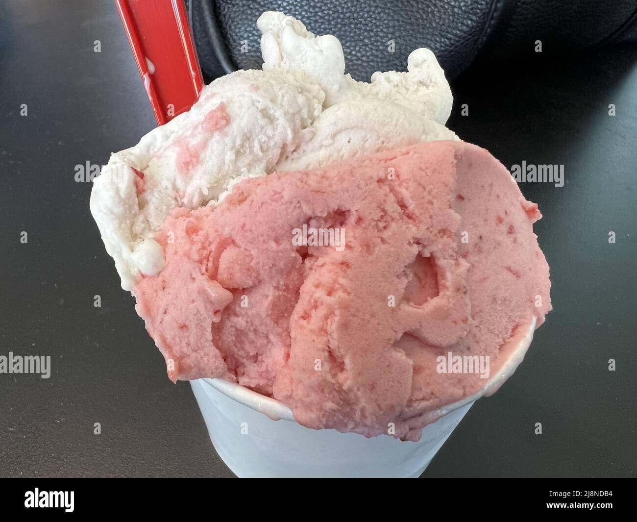 Cup of strawberry and banana gelato at Gio Gelati restaurant in San