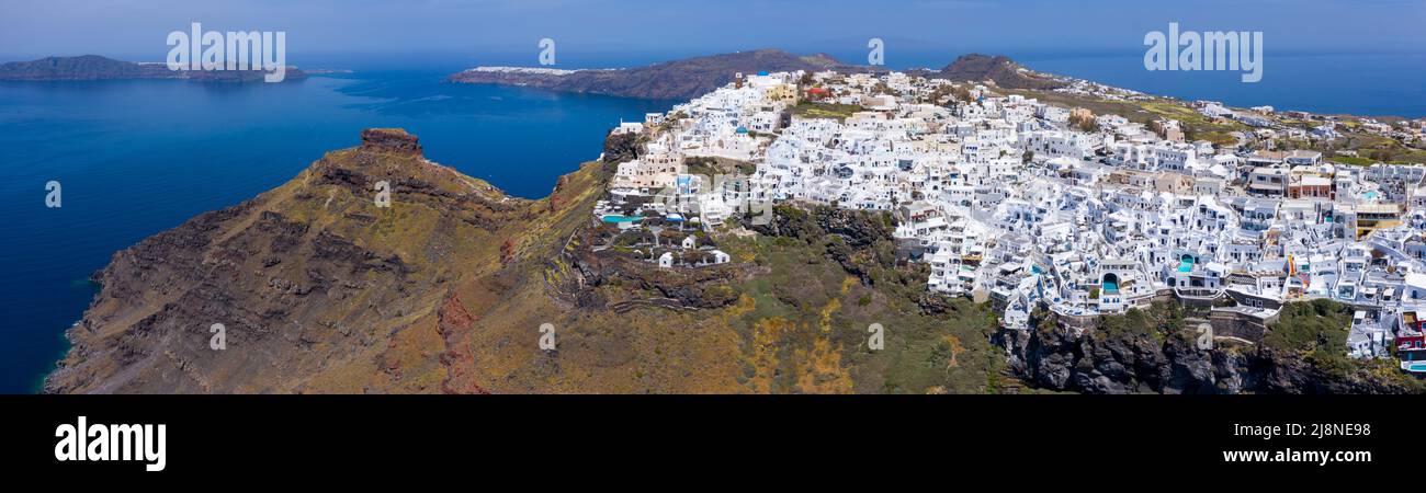 Fira town, with view of caldera, volcano and cruise ships, Santorini, Greece. Stock Photo