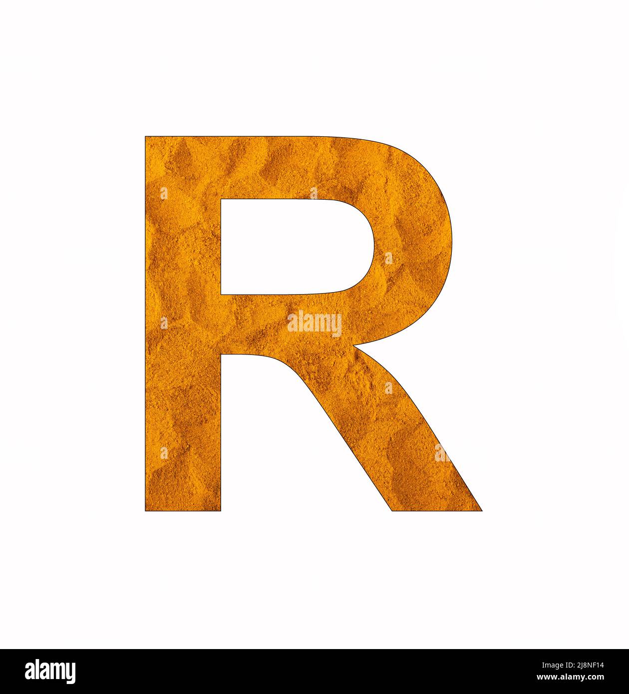 Letter R on turmeric background - Uppercase alphabet Stock Photo - Alamy