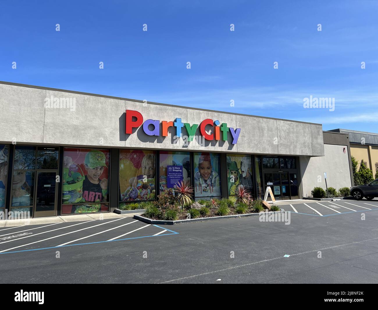 Party city store hires stock photography and images Alamy