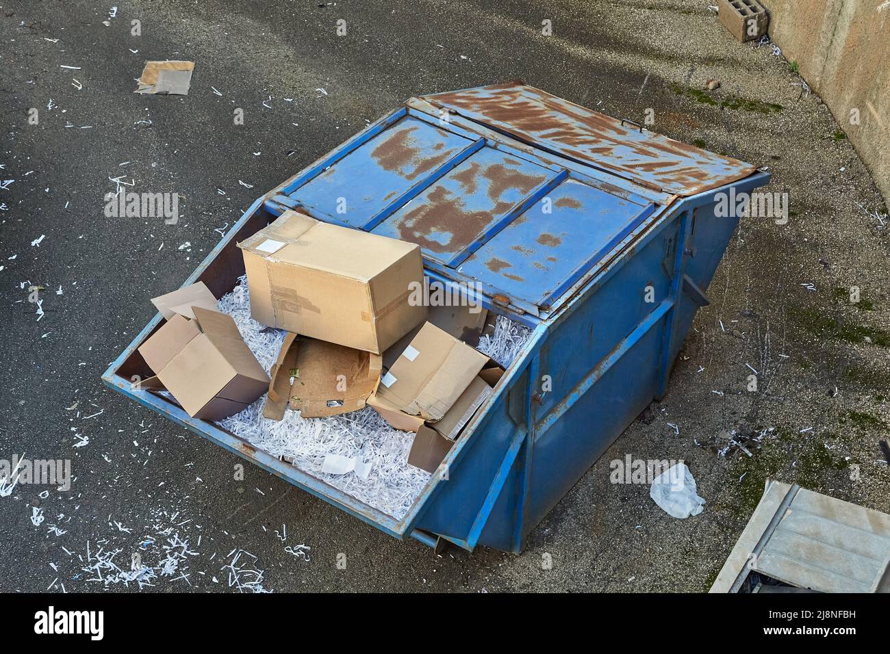 Shredded paper documents in a dump container Stock Photo - Alamy