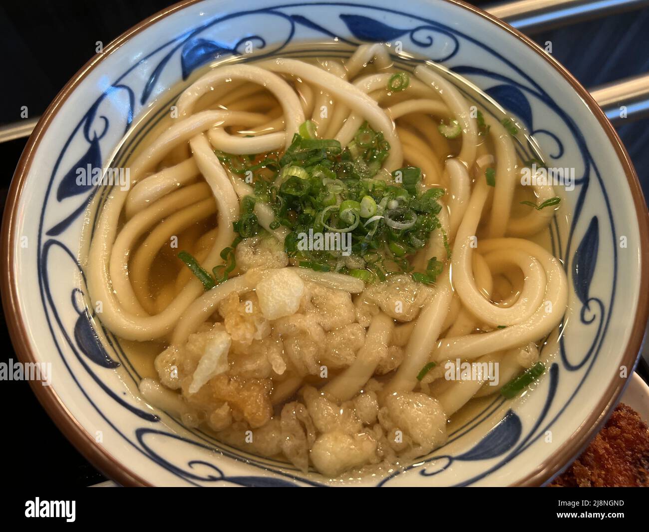 Closeup of bowl of udon soup during grand opening of Marugame Udon at