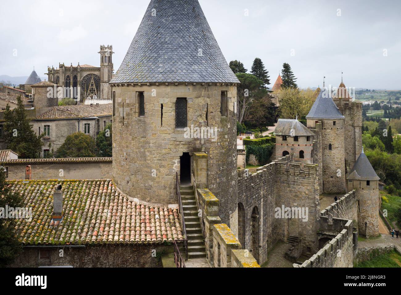 The Fortified Medieval Town of Carcassonne, Aude, France, restored by Viollet-le-Duc in the 19th Century, with the Basilica Church, Saint-Nazaire. Stock Photo