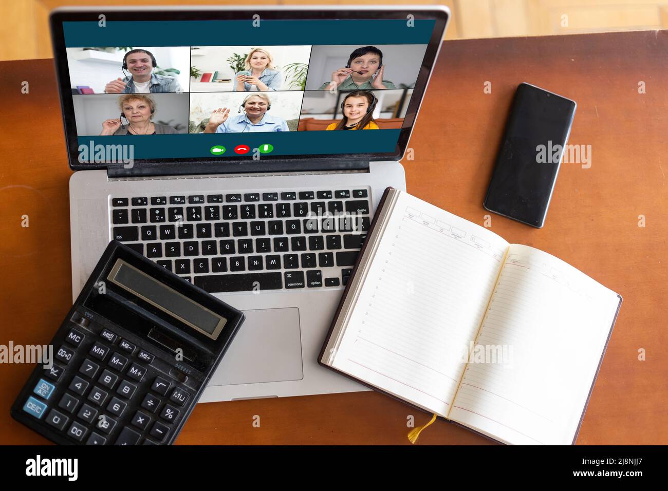 Laptop screen webcam view different ethnicity and age people engaged in group videocall. Video conference. Modern technology, easy convenient on-line Stock Photo