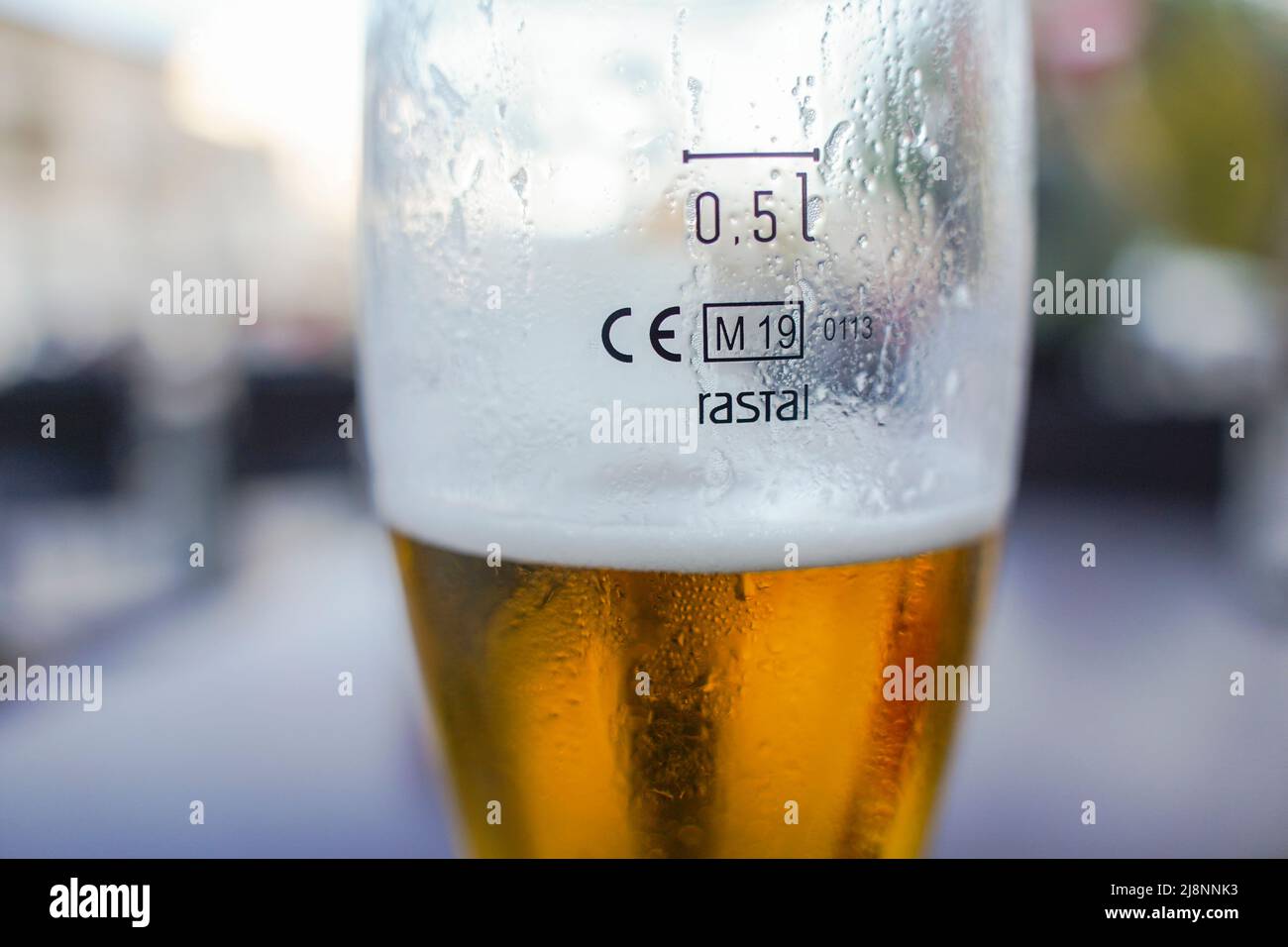Cisal glass of full beer with CE Marking 0.5l on table in Spain Stock