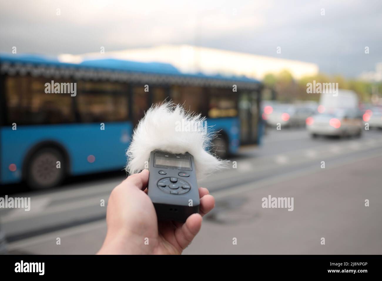 Voice recorder in hand. Recording sound effects, and ADR. Sounds of