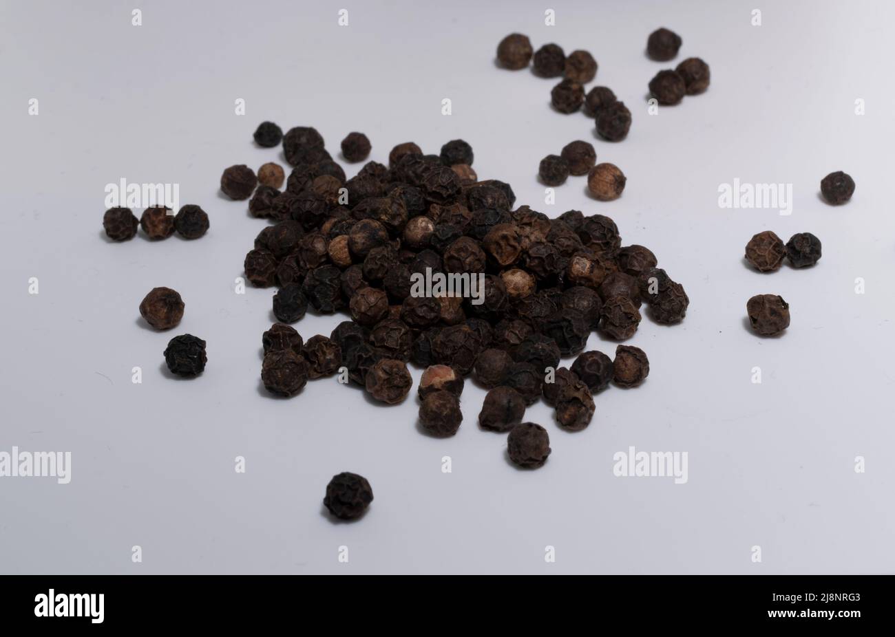 Lots of black pepper Stock Photo