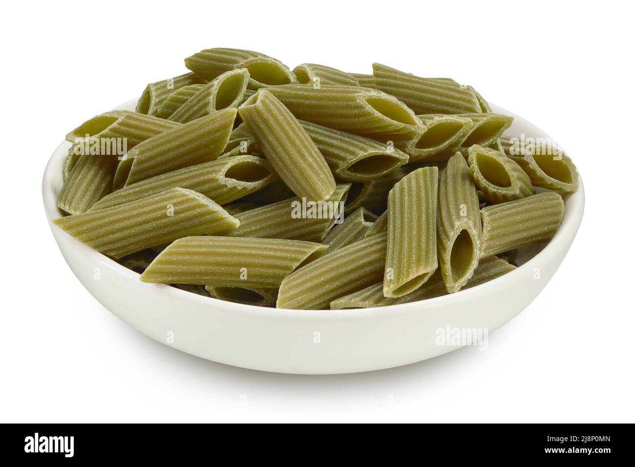 Green pea penne pasta in ceramic bowl isolated on white background with clipping path. Organic food speciality. Gluten free. Stock Photo
