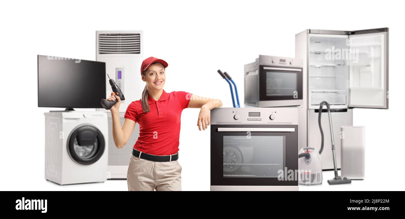 Repairwoman with a drill and home electrical appliances isolated on