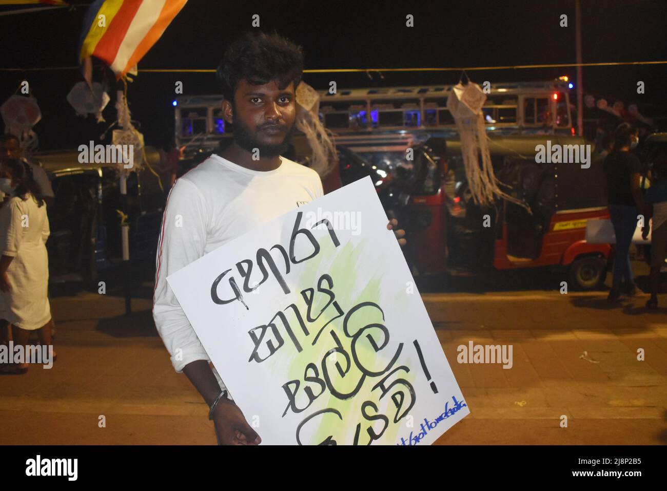 The protest continues amidst curfew and emergency law with the security forces allowed to shoot in case of violence. People gathered in large numbers on Vesak poya day at Galle face where the main protest has being held named Gota Go Gama for over a month. Colombo, Sri Lanka. Stock Photo