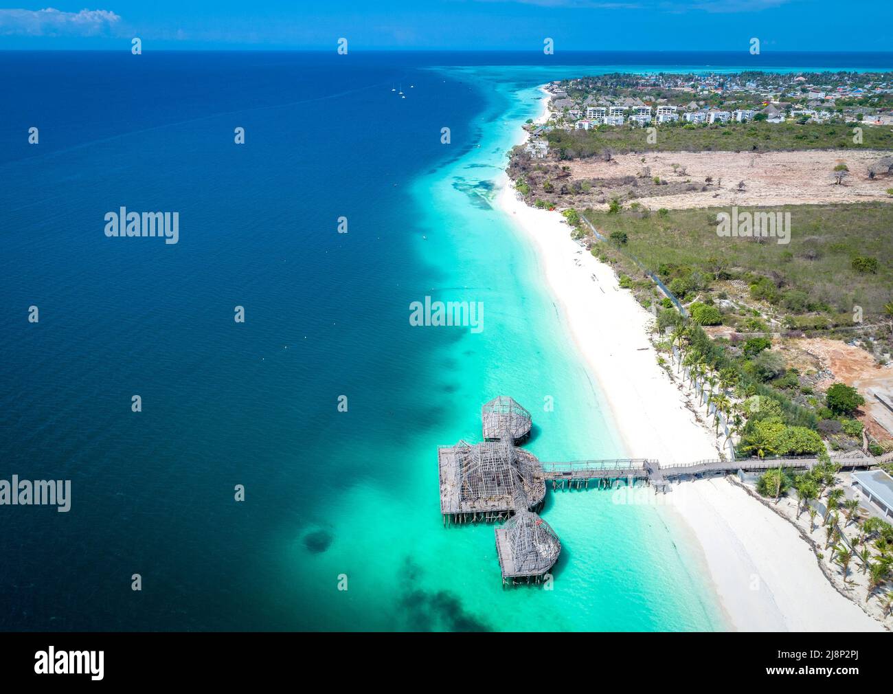 Aerial View Of Kendwa Beach In Zanzibar Tanzania With Luxury Resort aerial-view-of-kendwa-beach-in-zanzibar-tanzania-with-luxury-resort