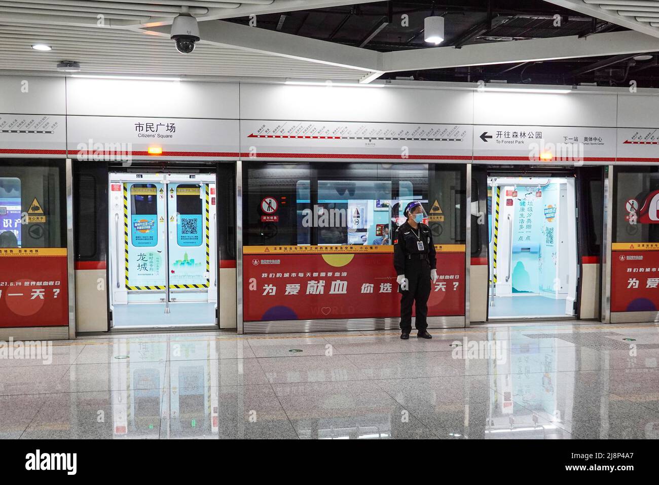 Changzhou, China. 17th May, 2022. A subway station worker wears a face mask as a precaution against the spread of covid-19 on duty. According to China Daily, China's dynamic zero-COVID-19 policy will help put the growth of its foreign trade on a firmer footing and mitigate the impact of fluctuations in the Chinese renminbi exchange rate against the greenback on business this year, experts and business leaders said on Monday. (Photo by Sheldon Cooper/SOPA Images/Sipa USA) Credit: Sipa USA/Alamy Live News Stock Photo