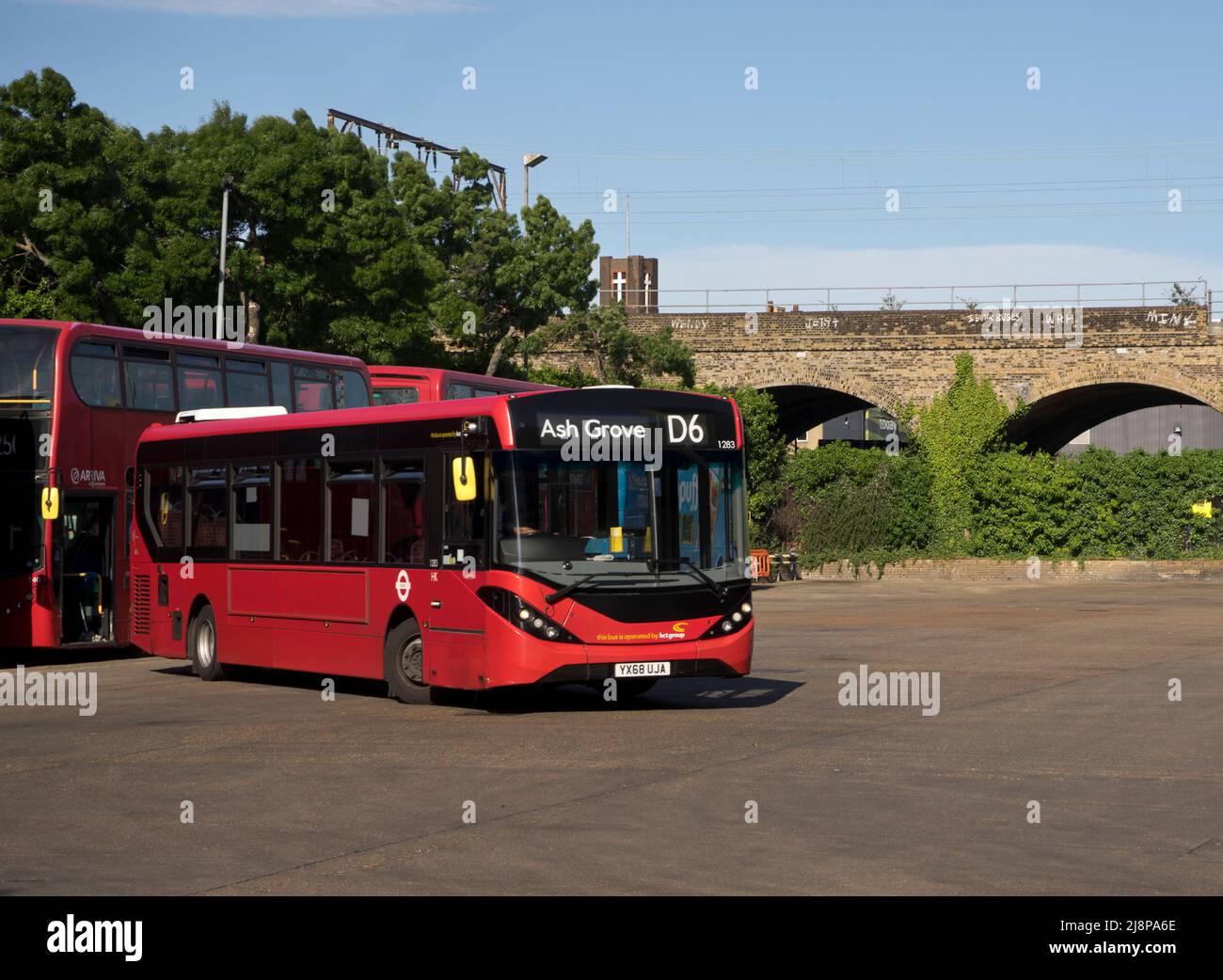 Bus transport depot redeveloped under railway arches by train and