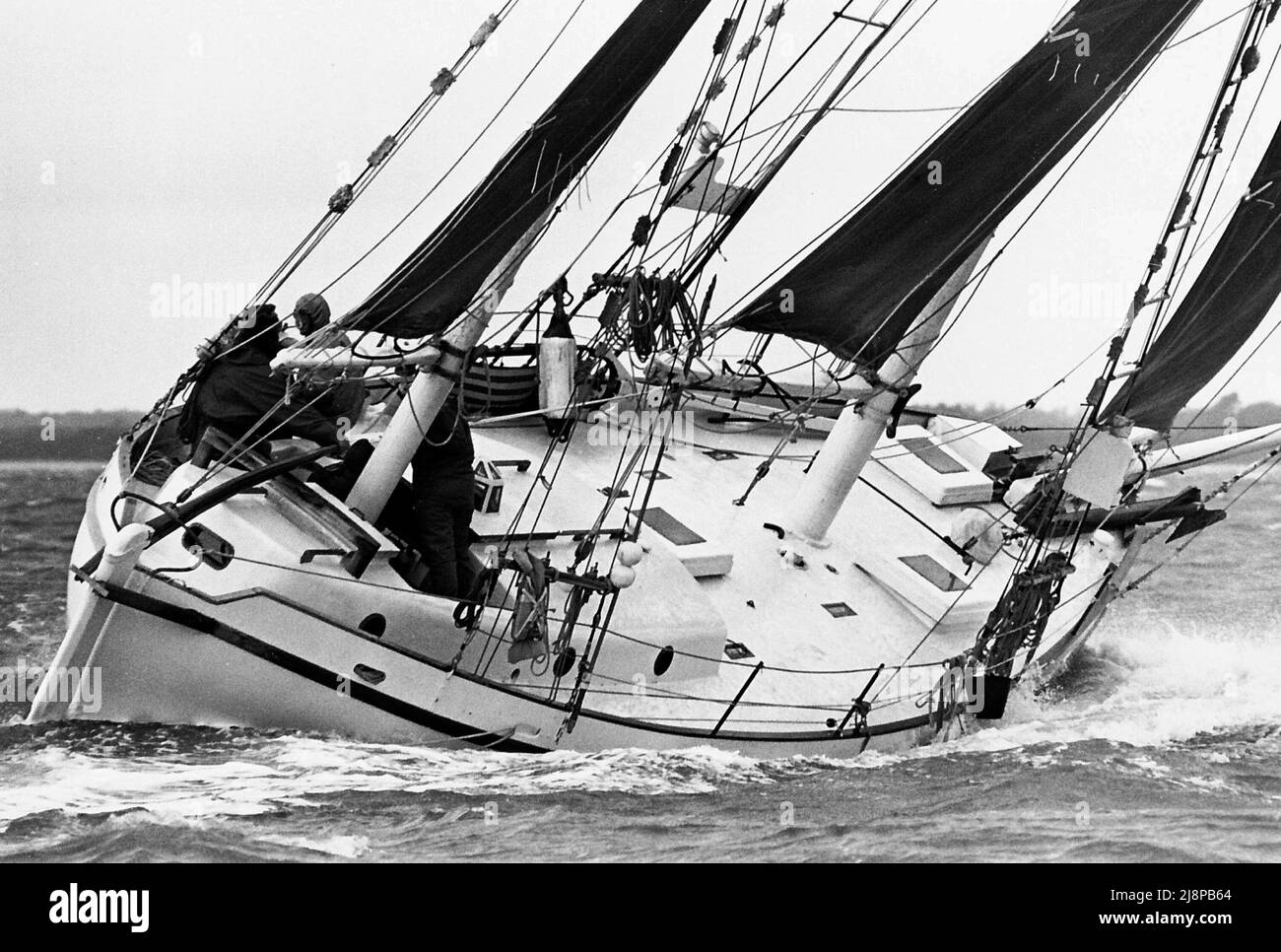 AJAXNETPHOTO. 16TH SEPTEMBER, 1977. SOLENT, ENGLAND. - OLD GAFFERS RACE - THE YACHT VENUS DESIGNED AND BUILT BY PAUL ERLING JOHNSON, IN HEAVY WEATHER DURING THE ANNUAL SOLENT CLASSIC RACE FOR GAFF RIGGED YACHTS. YACHT WAS LATER LOST OFF NORTH COAST OF AUSTRALIA.PHOTO:JONATHAN EASTLAND/AJAX REF:771609 57 Stock Photo
