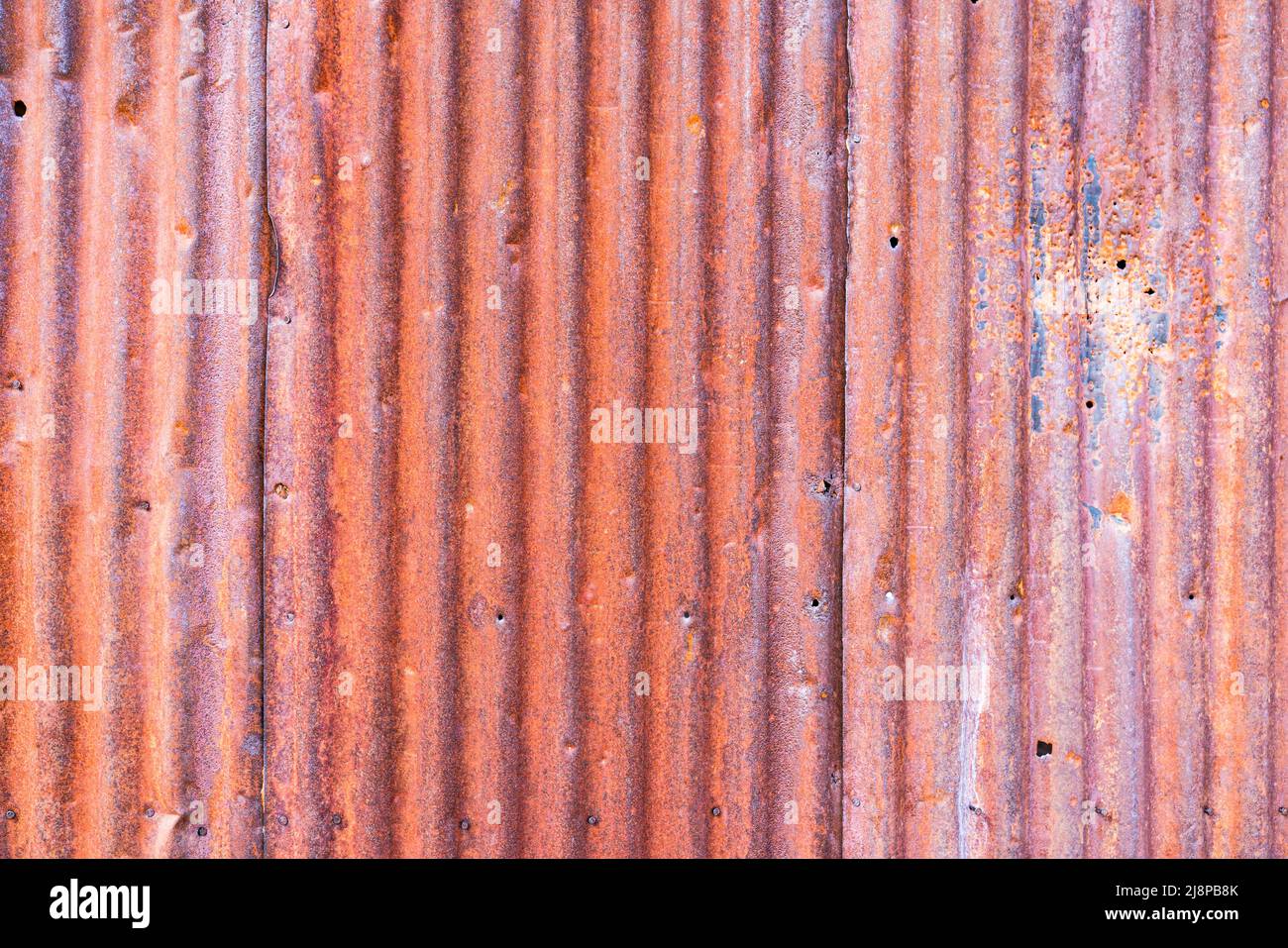 Old rusty corrugated steel sheet background Stock Photo