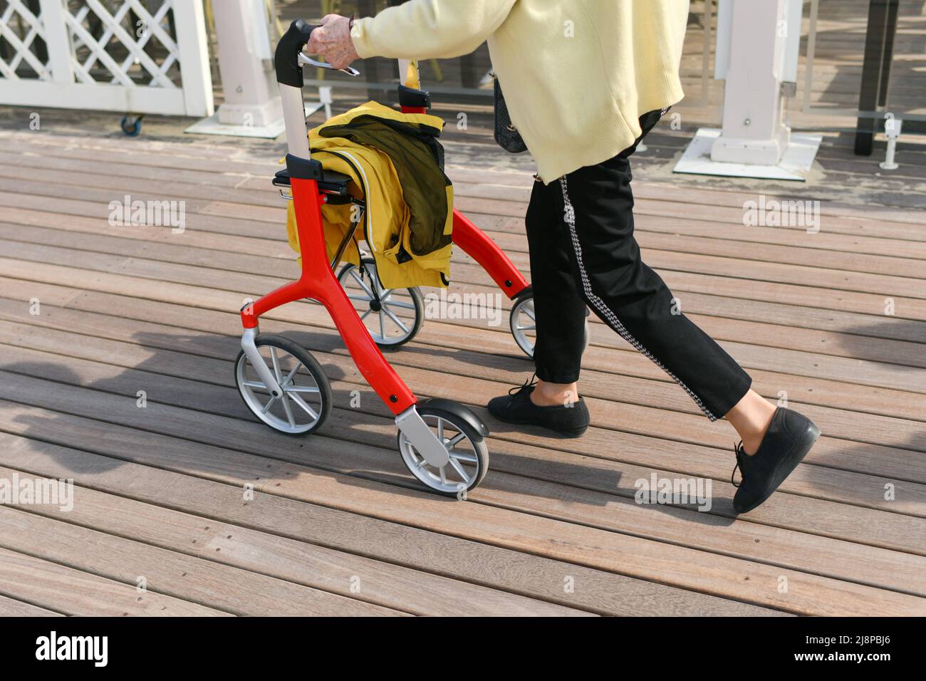 Wheeled walkers for the elderly Four wheel walker rollator Stock Photo