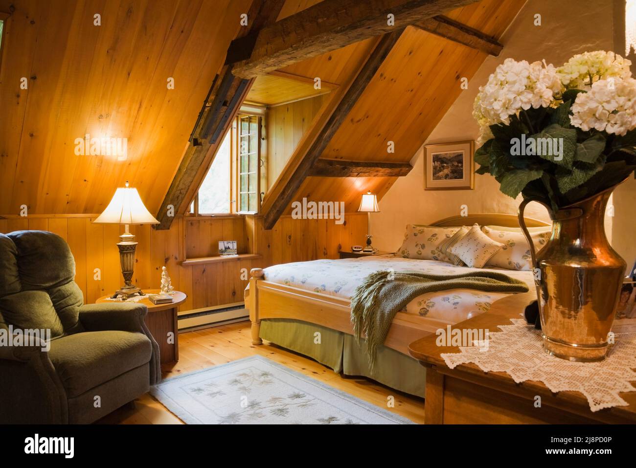 King size bed in main bedroom on upstairs floor inside old circa 1740