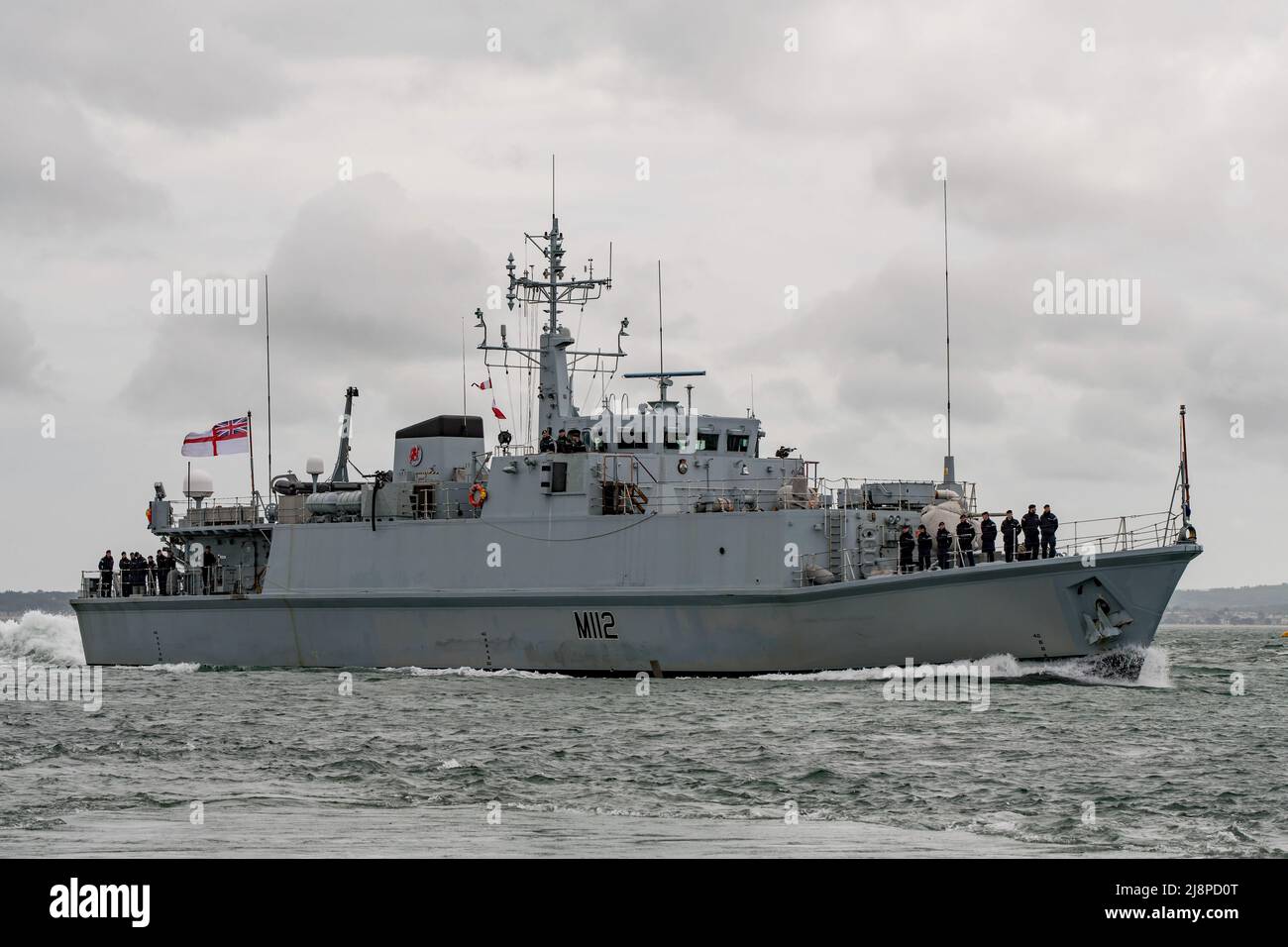 The Royal Navy mine warfare vessel HMS Shoreham (M112) approaching Portsmouth, UK on the 16th May 2022 for a rare visit prior to decommissioning. Stock Photo