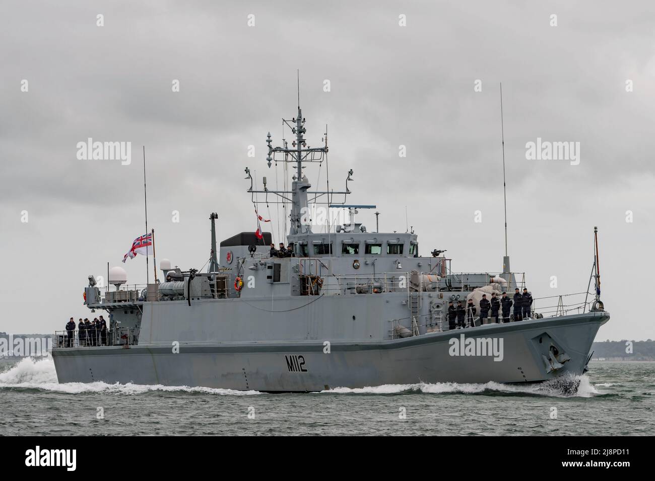 The Royal Navy mine warfare vessel HMS Shoreham (M112) approaching Portsmouth, UK on the 16th May 2022 for a rare visit prior to decommissioning. Stock Photo
