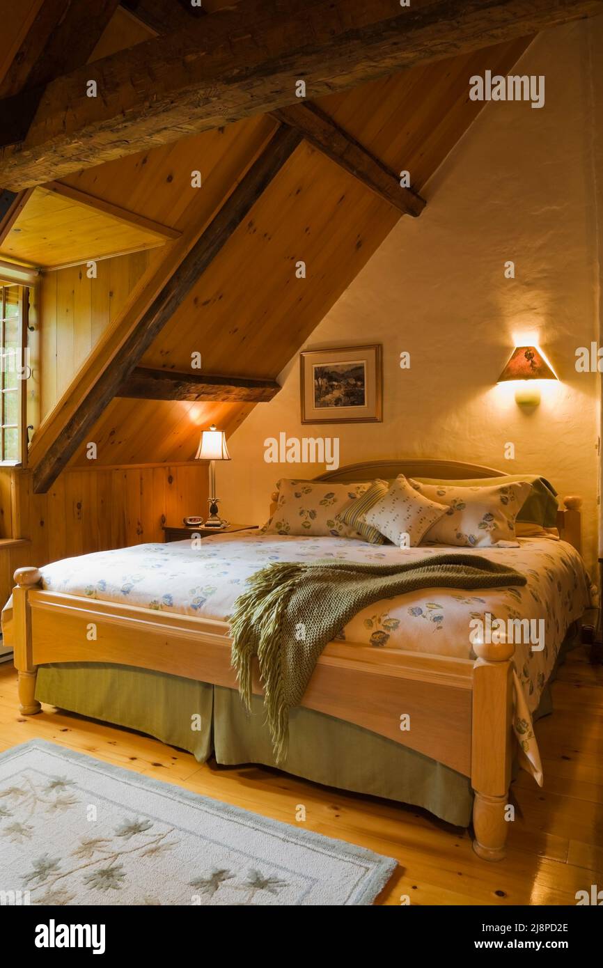 King size bed in main bedroom on upstairs floor inside old circa 1740