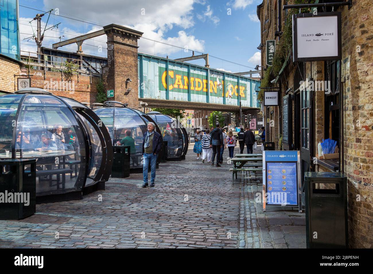 Diners eat their food in pods at Camden Market. The famous Camden