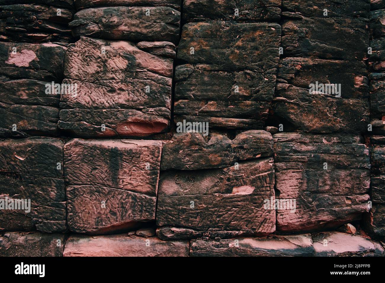 The ancient stone wall background Stock Photo - Alamy