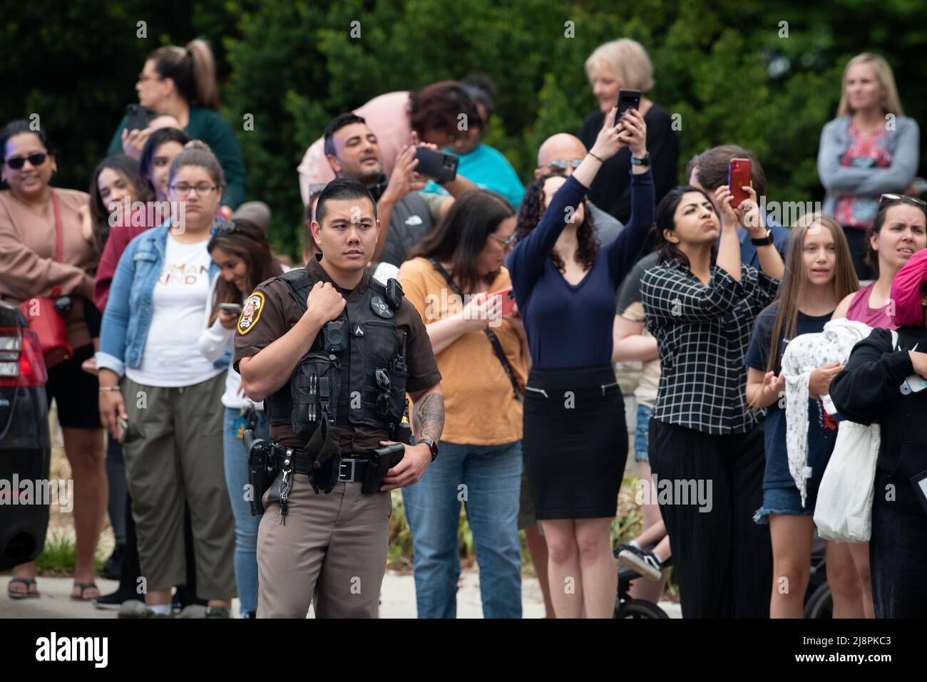 Fairfax County Sheriff's Deputies provide crowd control for Johnny Depp and Amber Heards departure from the Fairfax County Courthouse, in Fairfax, at the close of another day in his civil trial with Amber Heard, Thursday, May 5, 2022. Depp brought a defamation lawsuit against his former wife, actress Amber Heard, after she wrote an op-ed in The Washington Post in 2018 that, without naming Depp, accused him of domestic abuse.Credit: Cliff Owen/CNP/Sipa USA (RESTRICTION: NO New York or New Jersey Newspapers or newspapers within a 75 mile radius of New York City) Stock Photo