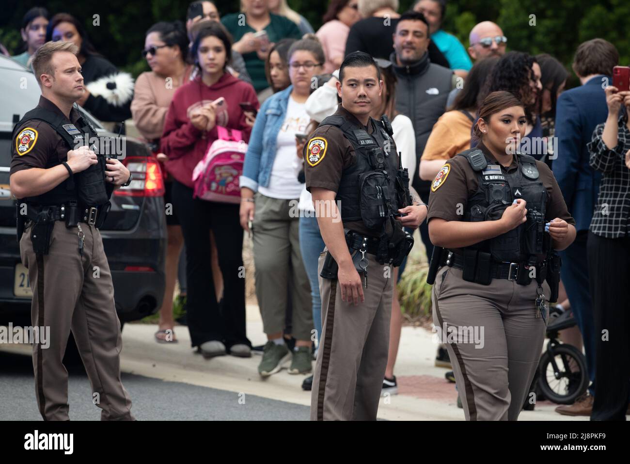 Fairfax County Sheriff's Deputies provide crowd control for Johnny Depp and Amber Heards departure from the Fairfax County Courthouse, in Fairfax, at the close of another day in his civil trial with Amber Heard, Thursday, May 5, 2022. Depp brought a defamation lawsuit against his former wife, actress Amber Heard, after she wrote an op-ed in The Washington Post in 2018 that, without naming Depp, accused him of domestic abuse.Credit: Cliff Owen/CNP/Sipa USA (RESTRICTION: NO New York or New Jersey Newspapers or newspapers within a 75 mile radius of New York City) Stock Photo