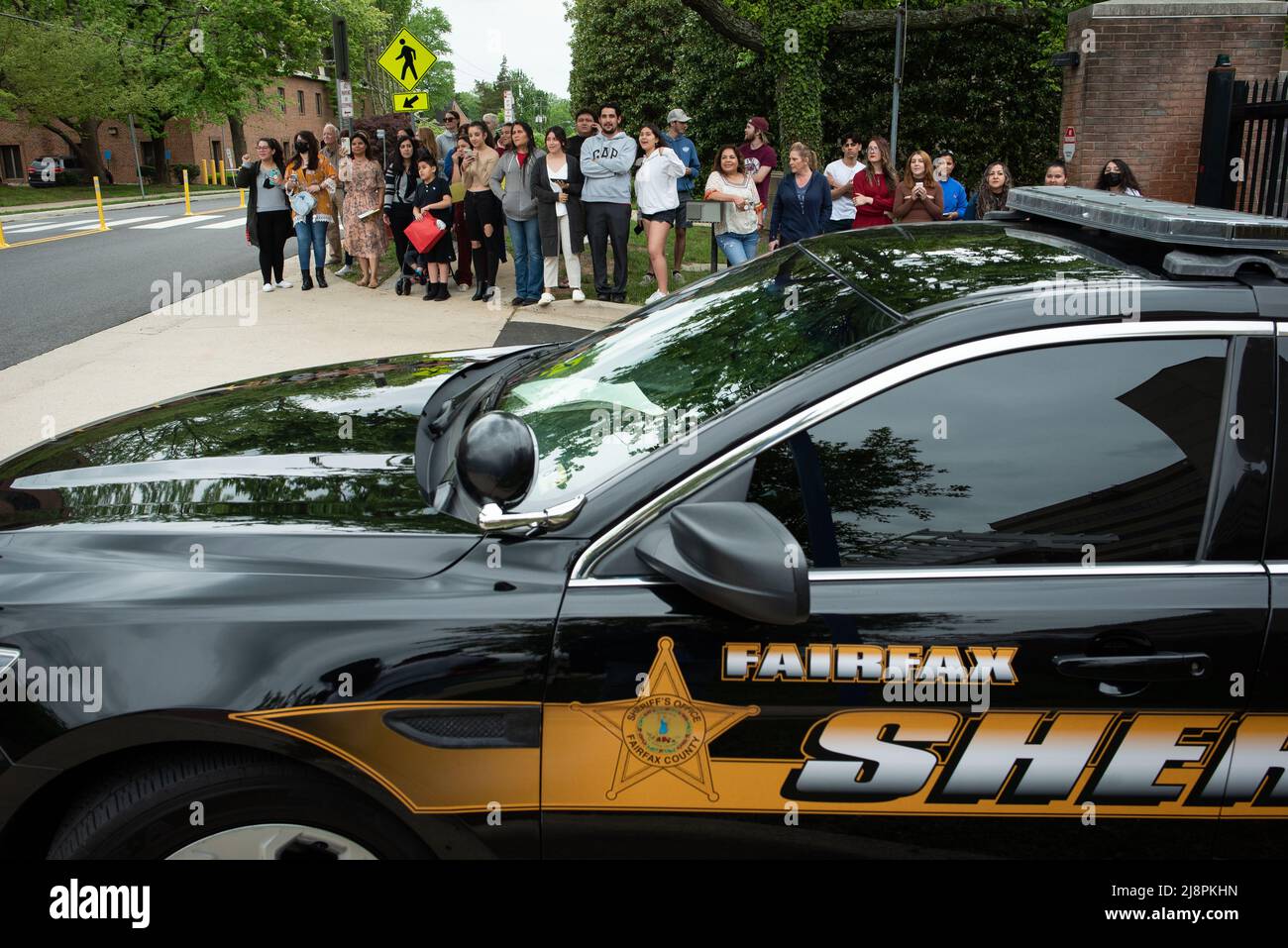 Fairfax County Sheriff's Deputies provide crowd control for the departures of Amber Heard and Johnny Deep from the Fairfax County Courthouse, in Fairfax, at the close of another day in his civil trial with Amber Heard, Thursday, May 5, 2022. Depp brought a defamation lawsuit against his former wife, actress Amber Heard, after she wrote an op-ed in The Washington Post in 2018 that, without naming Depp, accused him of domestic abuse.Credit: Cliff Owen/CNP/Sipa USA (RESTRICTION: NO New York or New Jersey Newspapers or newspapers within a 75 mile radius of New York City) Stock Photo