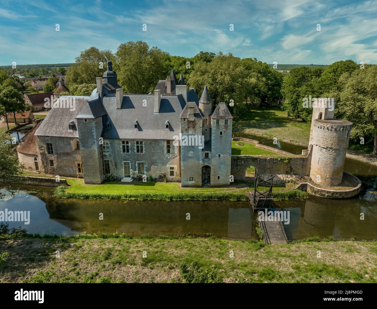 Aerial view of historic monument Bannegon castle in France on the border between Berry and Bourbonnais, with imposing keep, drawbridge, and a trapezoi Stock Photo