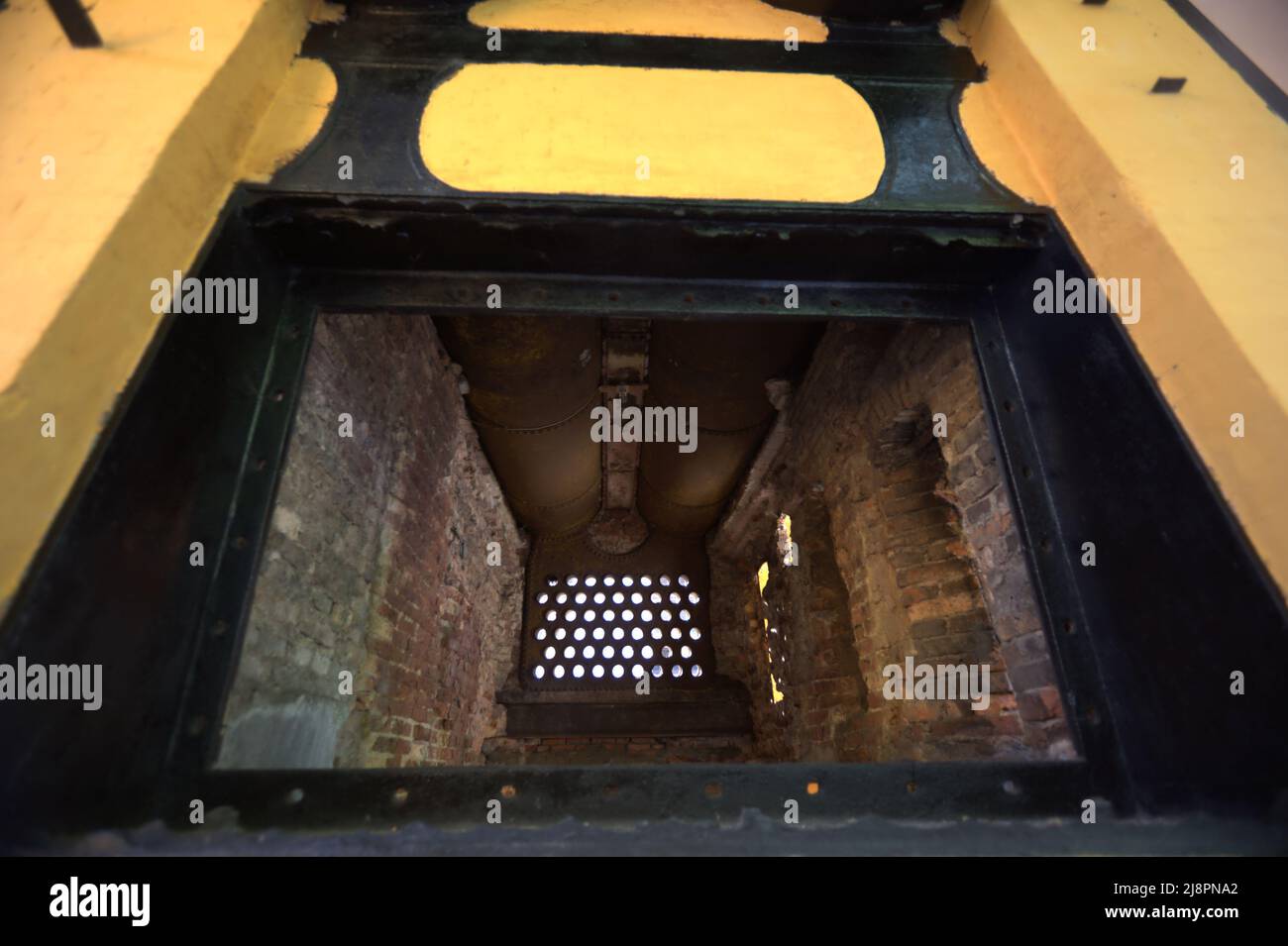 A look to the inside part of a coal-fired steam generator used for cooking during colonial coal mining operation in Sawahlunto, a former coal-mining town established by Dutch colonialists in late 19th century in West Sumatra, Indonesia. Stock Photo