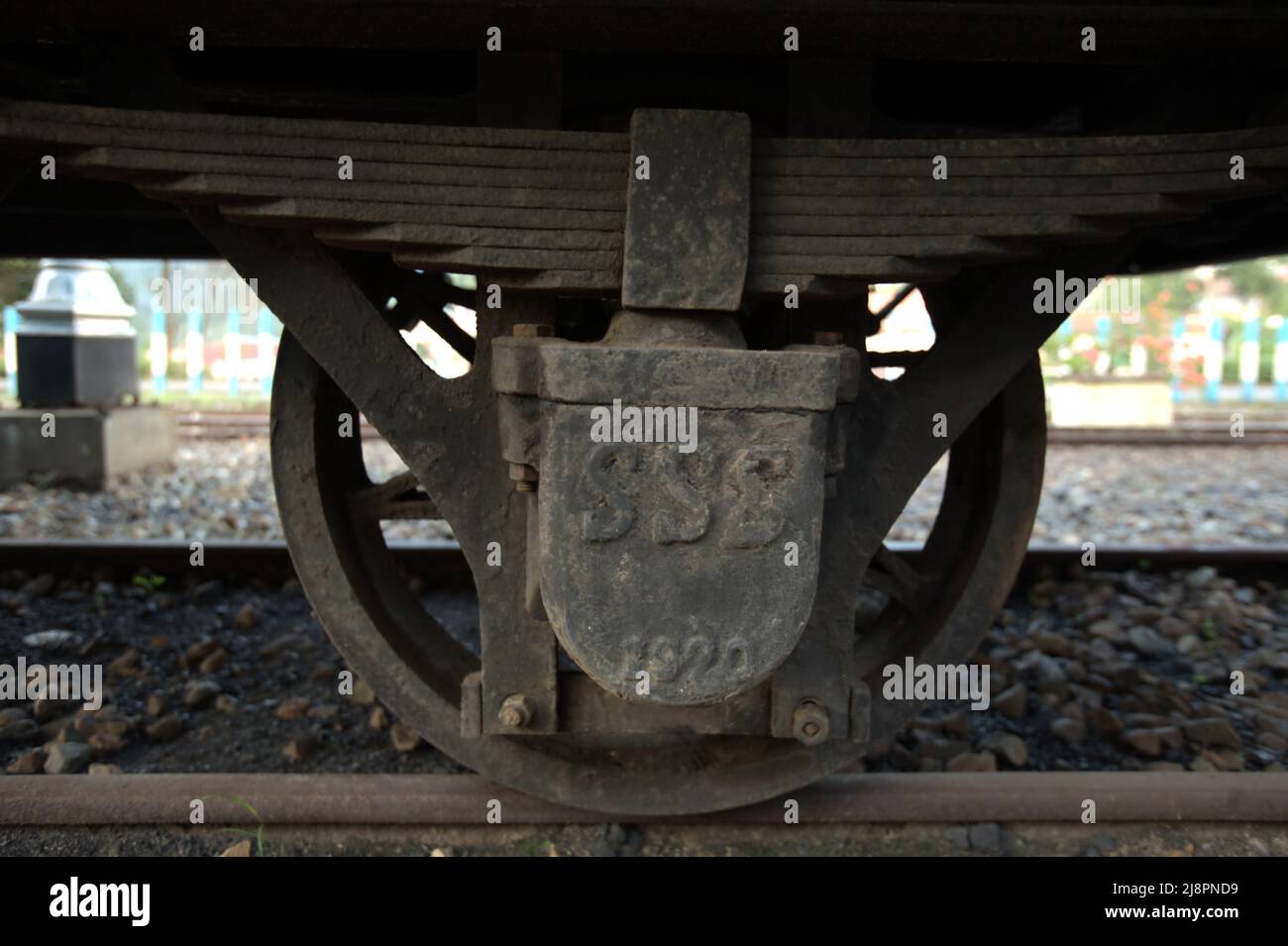 A train wheel at the train museum in Sawahlunto, a former coal-mining town established by Dutch colonialists in late 19th century in West Sumatra, Indonesia. Stock Photo