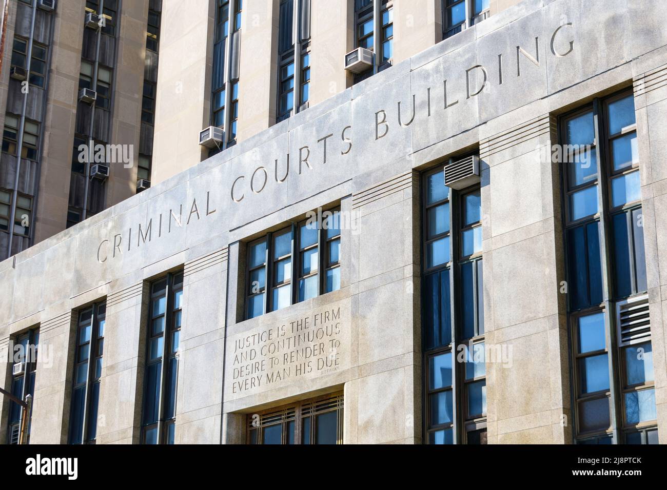 Criminal Courts Building sign on facade of Art Deco courthouse. - New York, USA, 2022 Stock Photo