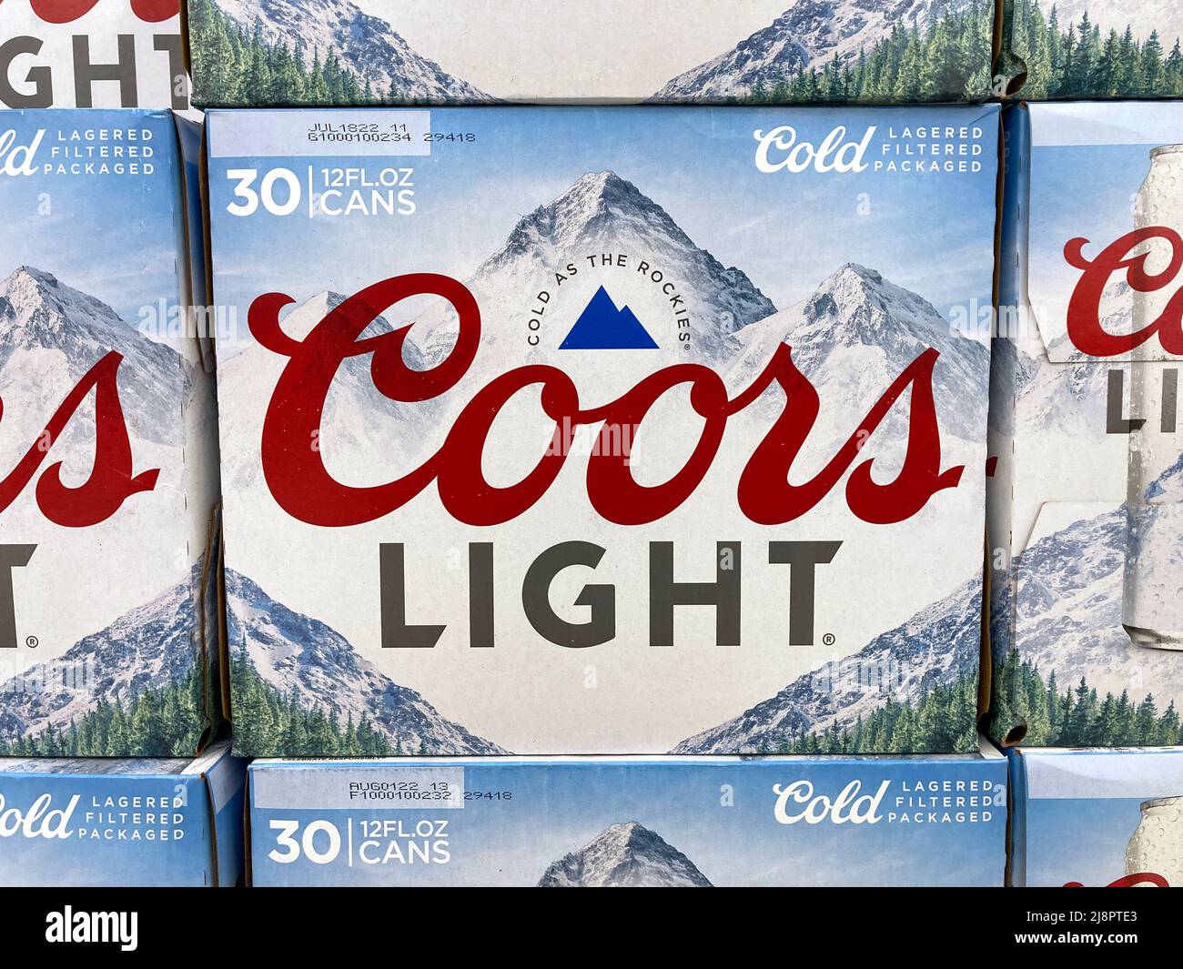 Coors Light 30 pack beer cans display at grocery store - Golden, Colorado, USA - 2022 Stock Photo