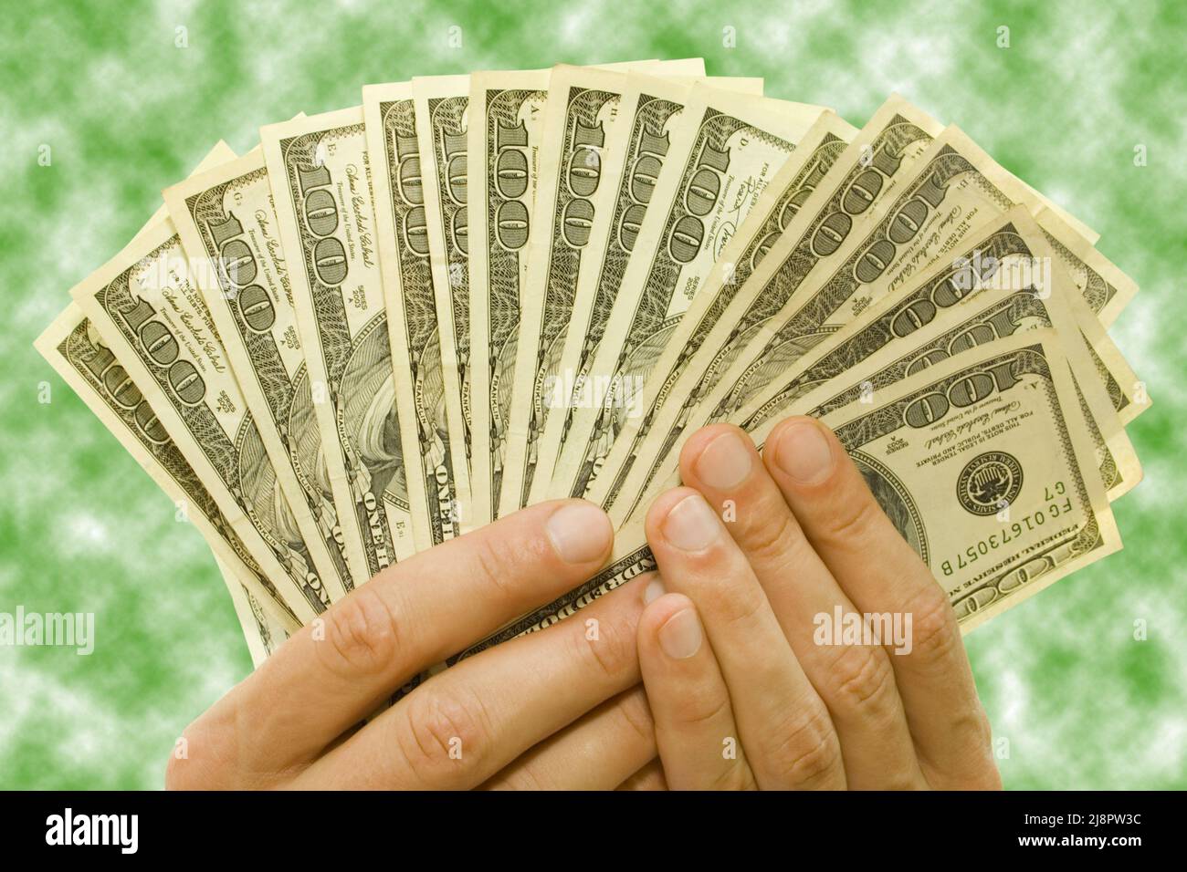 Money and finance concept. Dollars USD in hands over blur background
