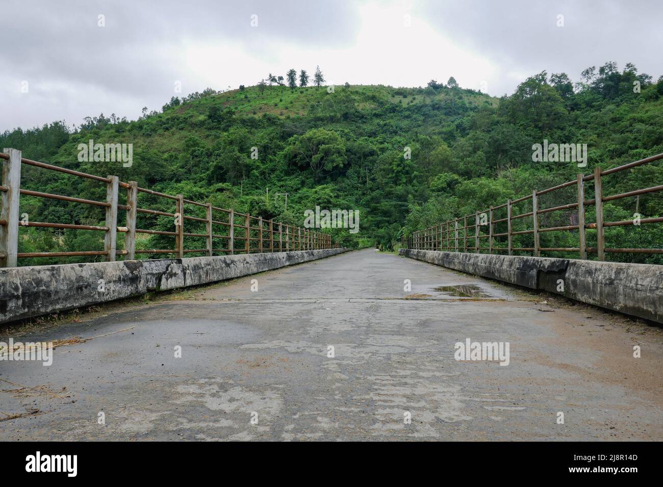 An empty bridge on Kiwirar River in Mbeya, Tanzania Stock Photo