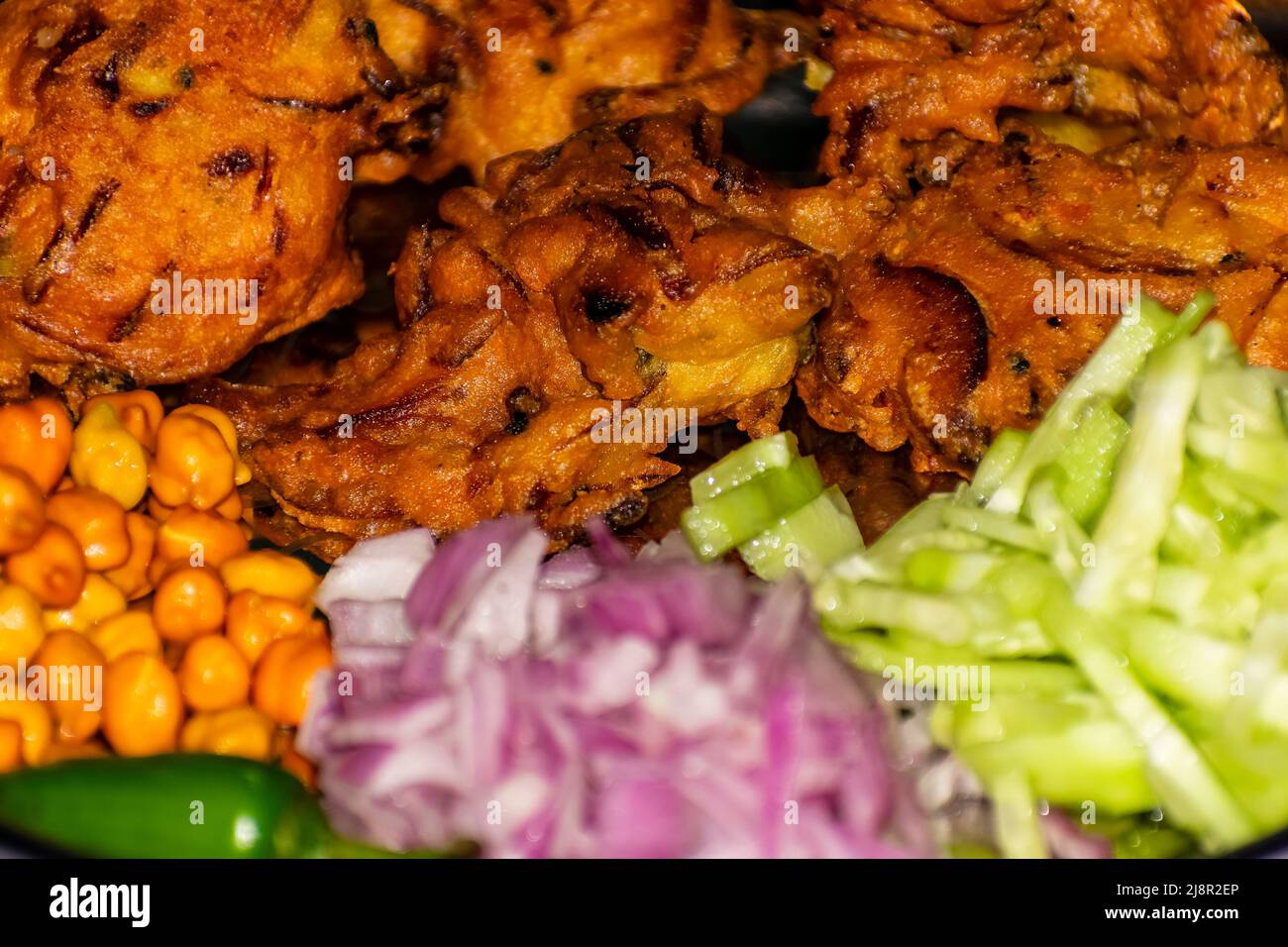 Crispy onion bhaji or kanda bhaji or fried onion pakoras or pakode