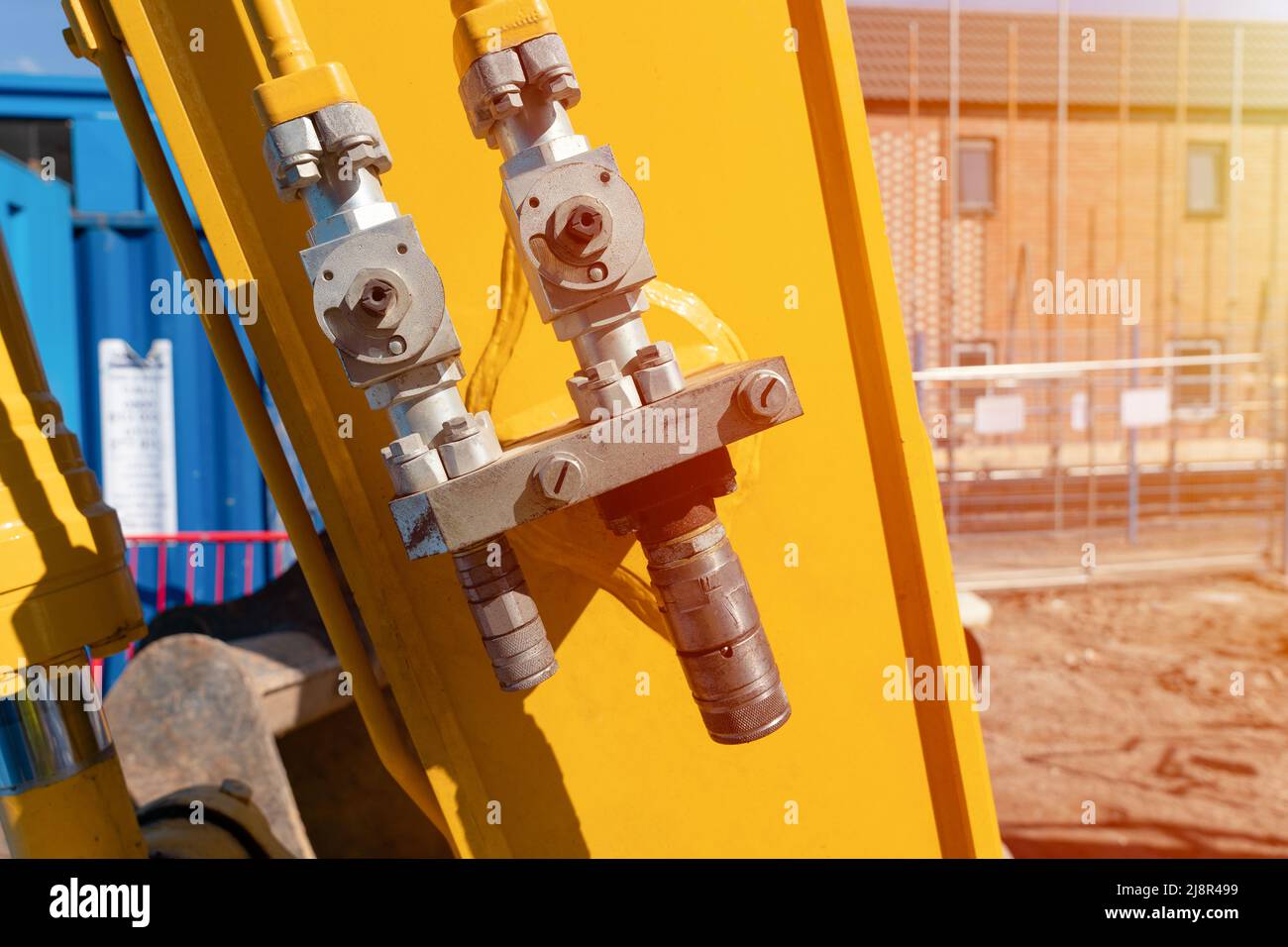Hydraulic high-pressure pipes system of the construction machinery for connection of the external attachments Stock Photo
