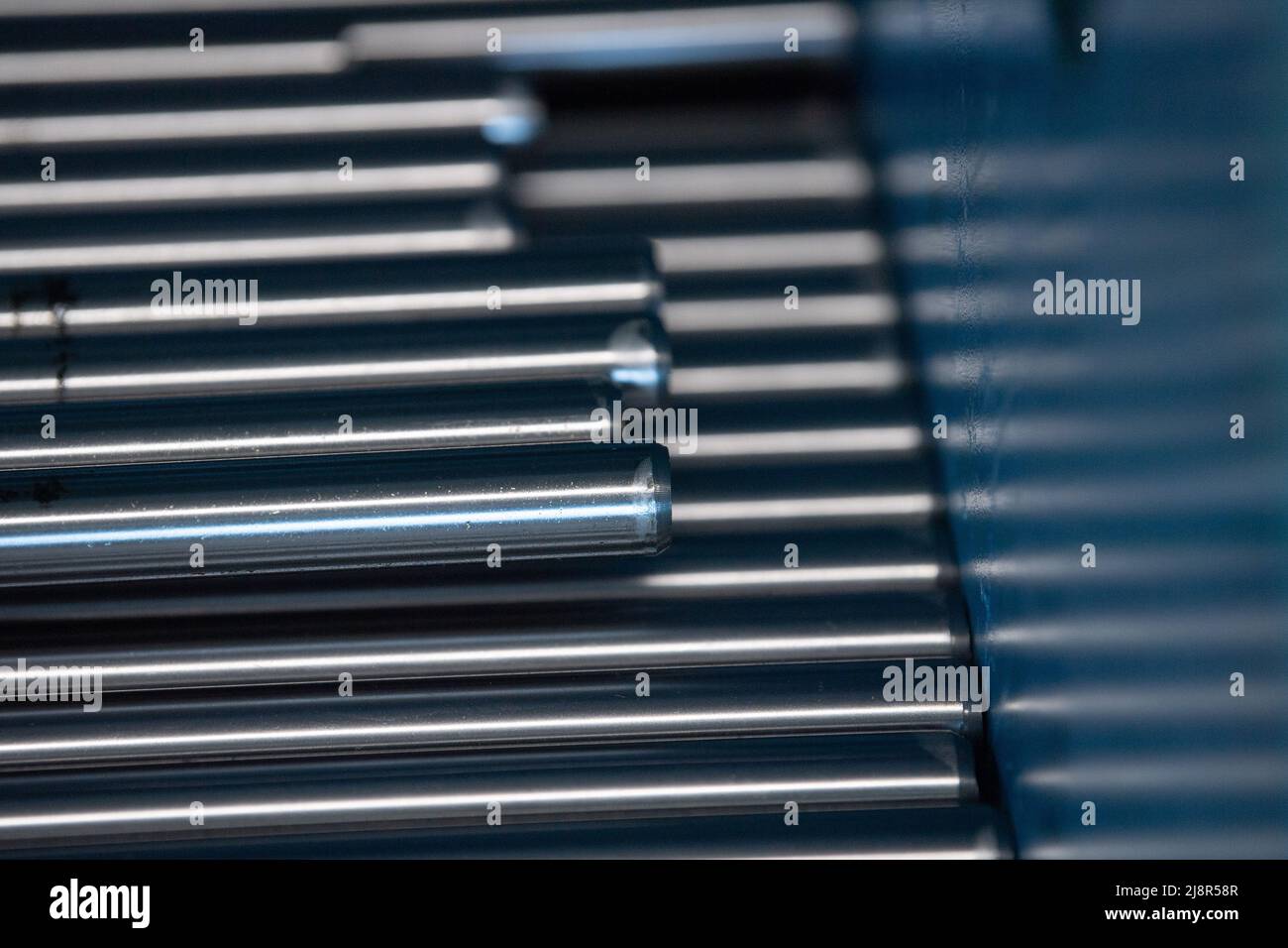 Egelsbach, Germany. 04th May, 2022. Metal bars are located at a mechanical engineering company. Credit: Sebastian Gollnow/dpa/Alamy Live News Stock Photo