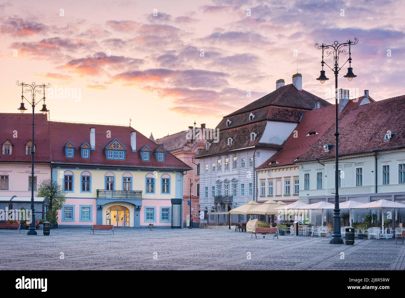Cityscape with beautiful old buildings on Big Square (Piata Mare) in historical center of Sibiu