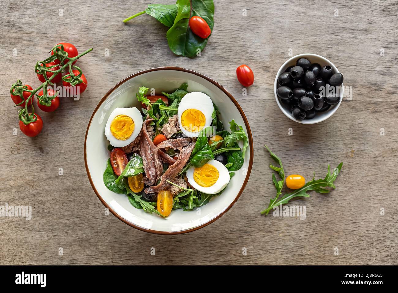 French composed salad with tuna, anchovy, hardboiled eggs, tomatoes