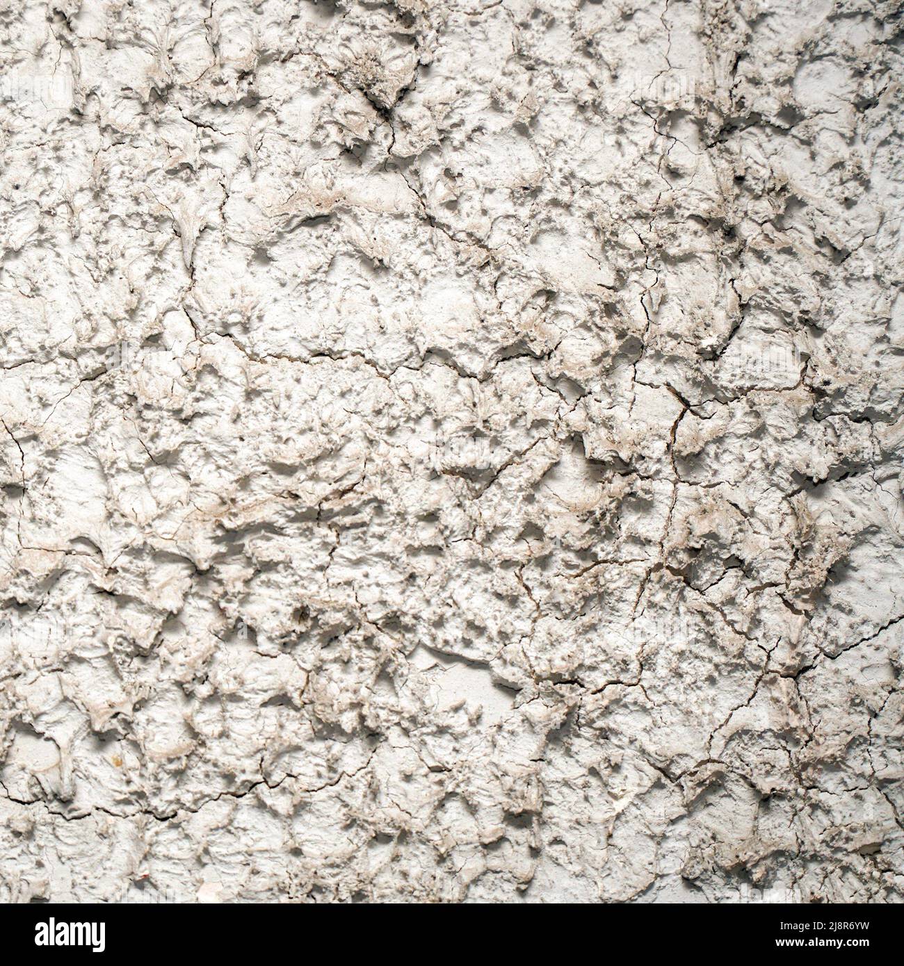 The wall is covered with gray decorative plaster Stock Photo