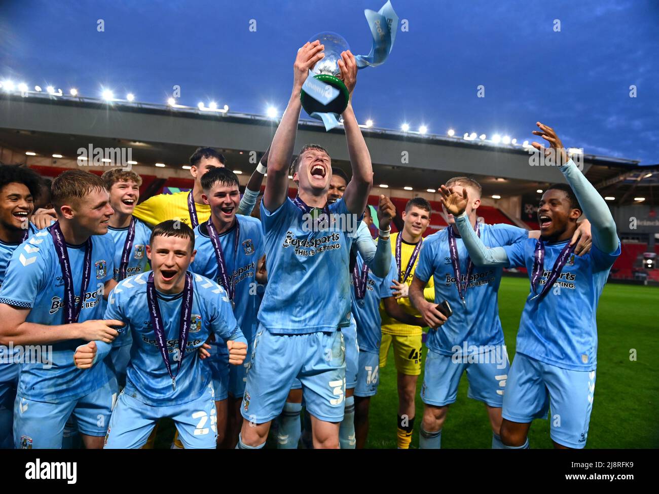 Coventry City's Burroughs (centre) and teammates celebrate