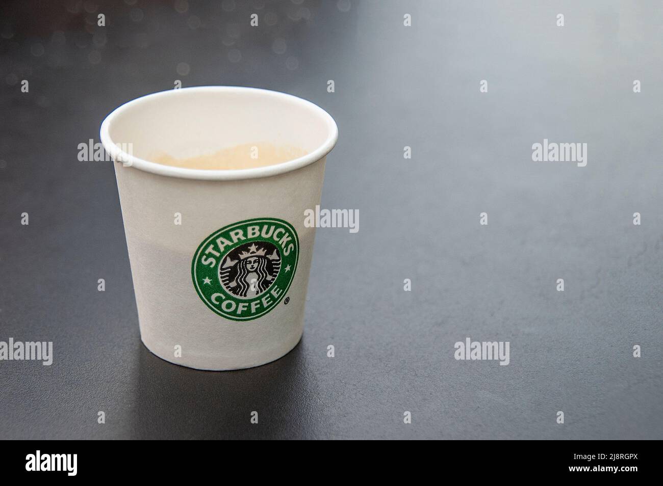 London, UK - May 18, 2022 - Starbucks espresso in paper cup Stock Photo