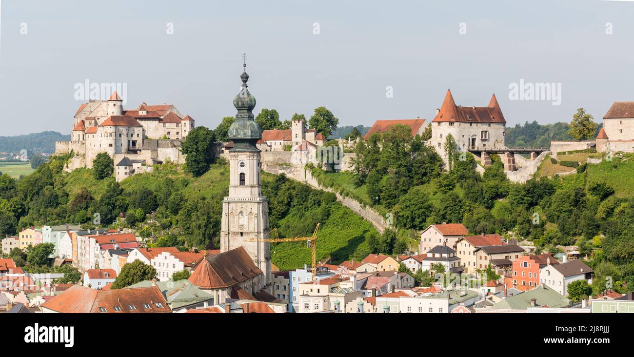Burghausen, Germany - July 24, 2021: Panorama with Burghausen Castle, church St. Jakob and Georgstor (Georg's gate). Stock Photo