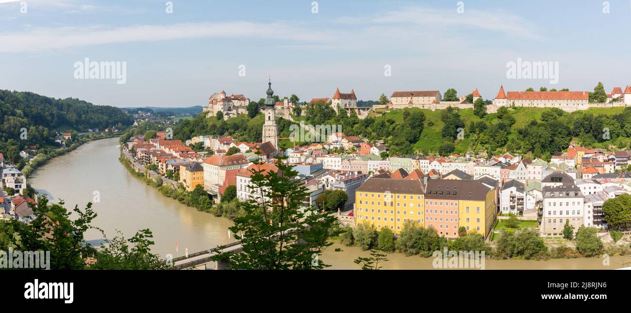 Burghausen, Germany - July 24, 2021: Panoramic view of the town of Burghausen. With river Salzach, historical buildings and the famous castle. Stock Photo